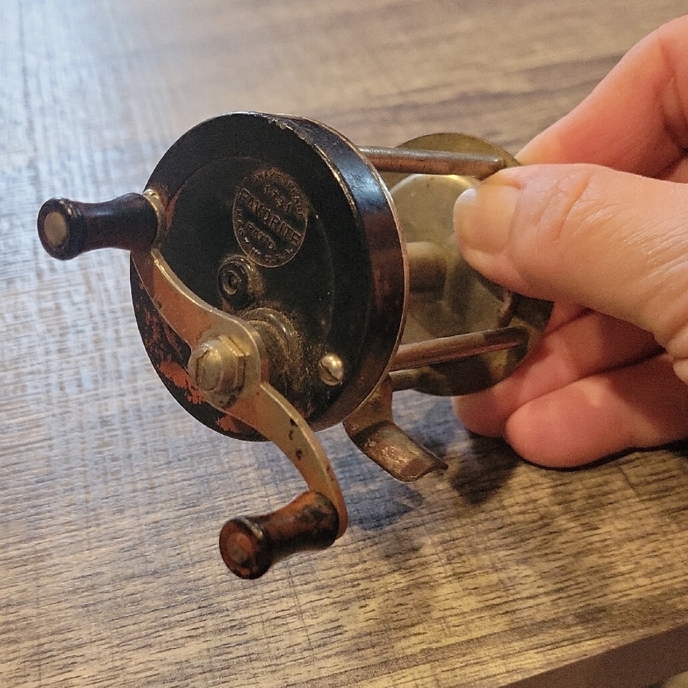 Vintage Shakespeare Fishing Reel with Wooden Handles